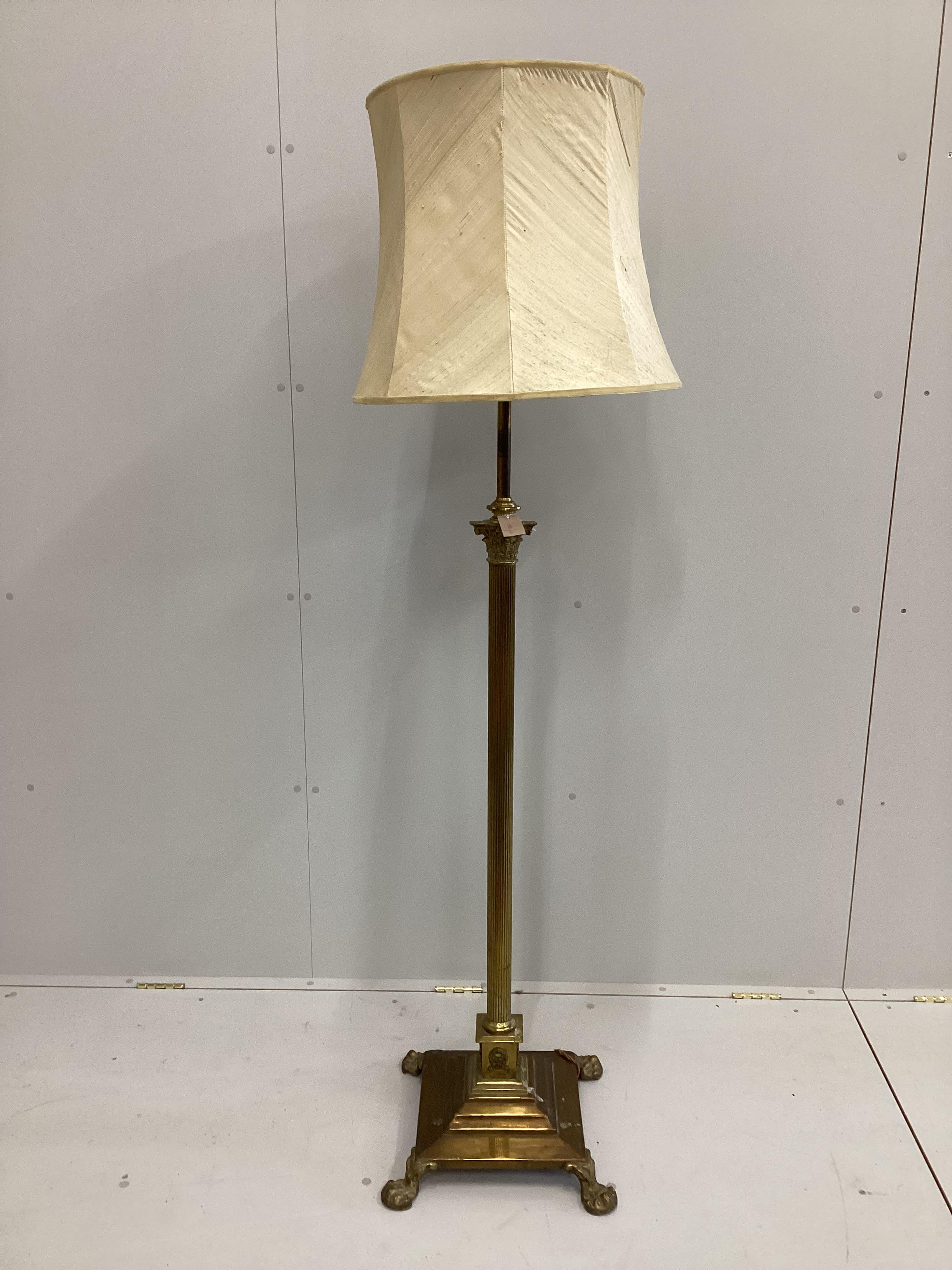 An Edwardian brass Corinthian column telescopic standard lamp, converted